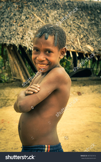 black naked males stock photo will papua guinea july young half naked boy crossed arms black pic